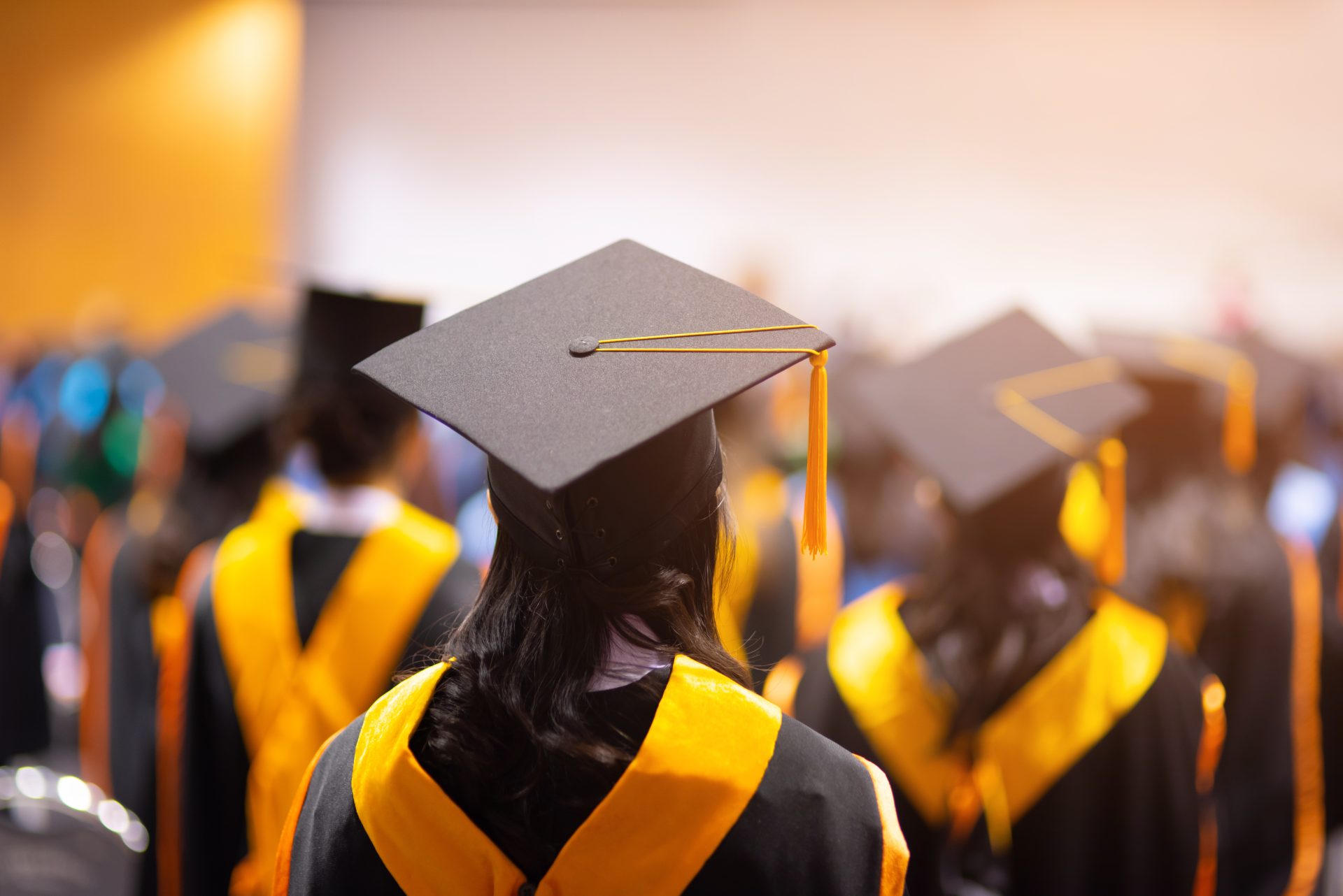 behind view of graduating students